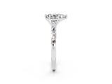 White gold Pear Cut Moissanite Solitaire with Side Baguettes and Channel Set Band_2