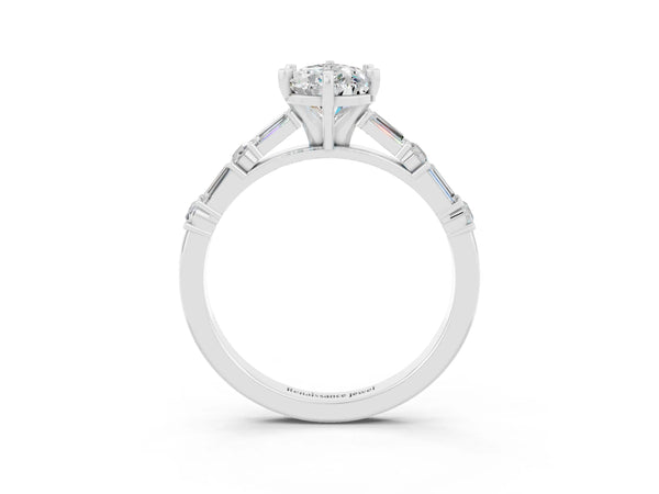 Platinum Pear Cut Moissanite Solitaire with Side Baguettes and Channel Set Band