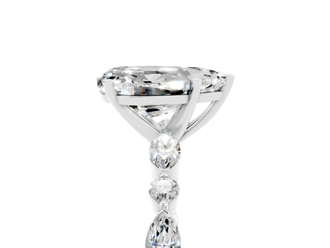 White gold Pear Cut Moissanite Solitaire with Side Stones on a Pavé Band and Four-Prong Setting_5