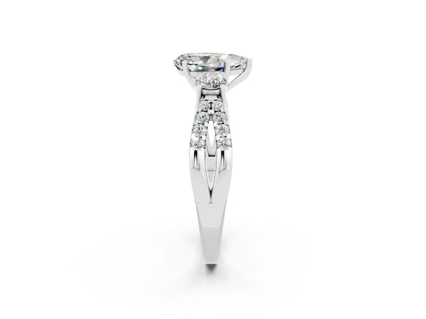 White gold Pear Cut Moissanite Three-Stone Ring with Pavé Split Shank and Four-Prong Setting