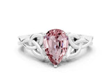 White gold Pear Cut Morganite Solitaire Engagement Ring with Celtic Knot Band and Four-Prong Setting