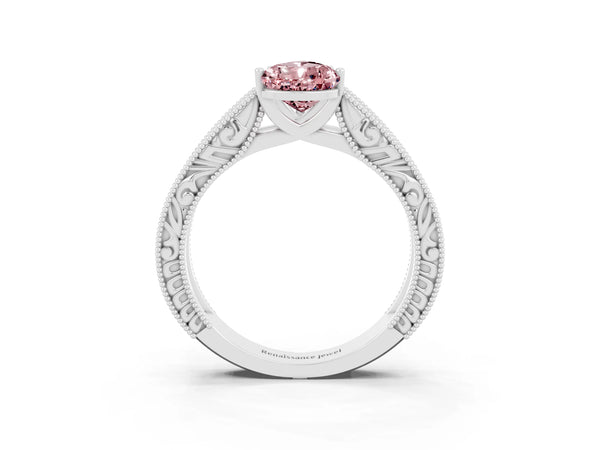 Platinum Pear Cut Morganite Solitaire Ring with Engraved Band and Four-Prong Setting