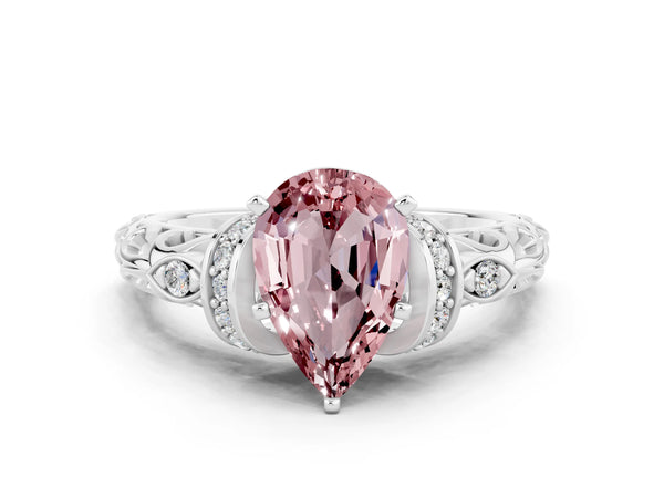 Platinum Pear Cut Morganite Solitaire Ring with Filigree Band and Four-Prong Setting