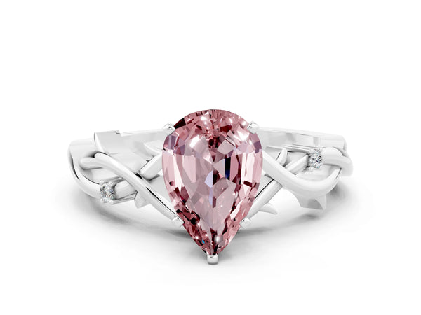 White gold Pear Cut Morganite Solitaire Ring with Twisted Band and Prong Setting