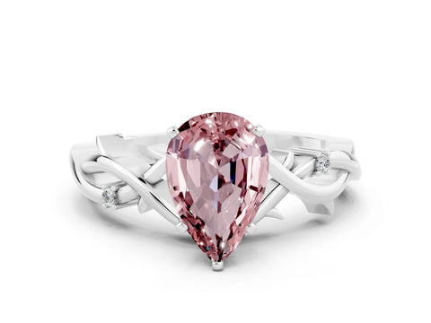 White gold Pear Cut Morganite Solitaire Ring with Twisted Band and Prong Setting