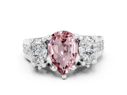 White gold Pear Cut Morganite Three-Stone Ring with Channel Set Band and Four-Prong Setting