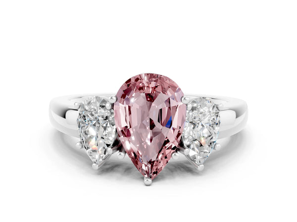 Platinum Pear Cut Morganite Three-Stone Ring with Four-Prong Setting and Classic Band