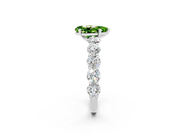 White gold Pear Cut Peridot Prong Setting with Side Stones on a Pave Band