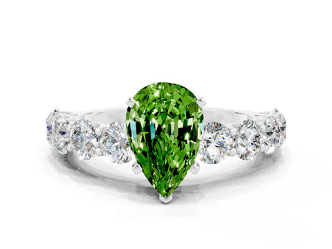 White gold Pear Cut Peridot Prong Setting with Side Stones on a Pave Band