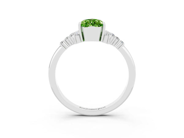 White gold Pear Cut Peridot Ring with Side Stones and Four-Prong Setting