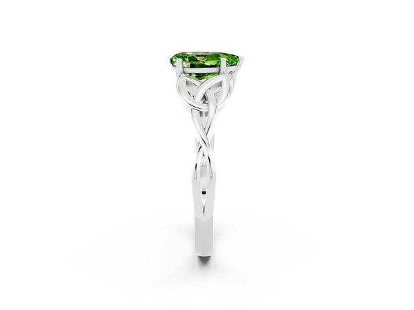 Platinum Pear Cut Peridot Solitaire Celtic Knot Ring with Four-Prong Setting