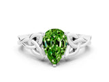 White gold Pear Cut Peridot Solitaire Engagement Ring with Celtic Knot Band and Four-Prong Setting