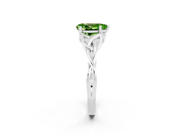 Silver Pear Cut Peridot Solitaire Engagement Ring with Celtic Knot Band and Four-Prong Setting