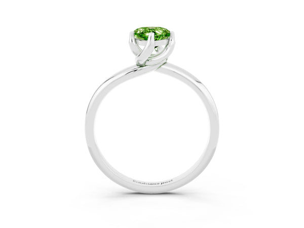 White gold Pear Cut Peridot Solitaire Engagement Ring with Four-Prong Setting and Classic Band