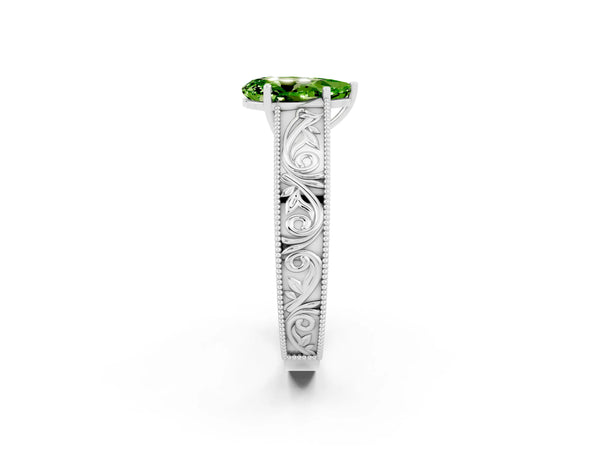 White gold Pear Cut Peridot Solitaire Ring with Engraved Band and Four-Prong Setting