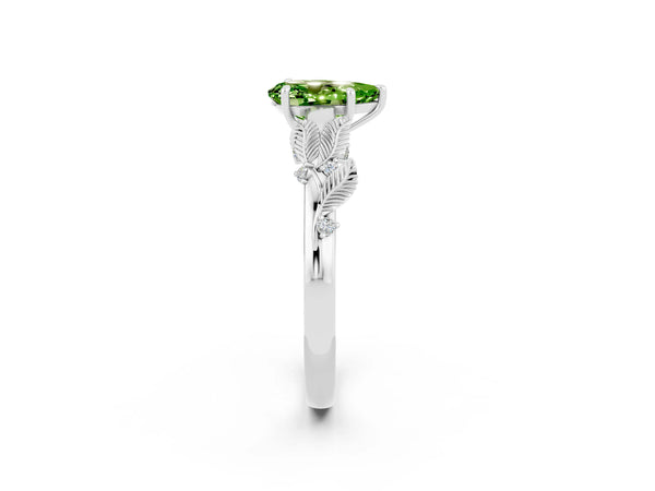 Platinum Pear Cut Peridot Solitaire Ring with Leaf Motif Band and Four-Prong Setting