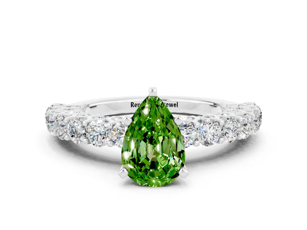 Platinum Pear Cut Peridot Solitaire Ring with Shared Prong Pavé Band and Four-Prong Setting