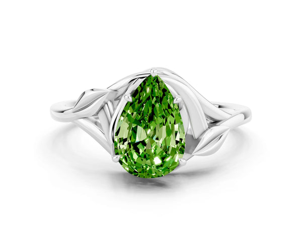 Platinum Pear Cut Peridot Solitaire Ring with Twist Band and Four-Prong Setting