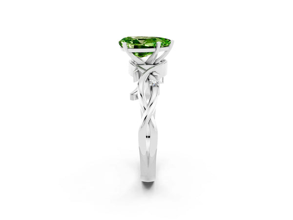 Silver Pear Cut Peridot Solitaire Ring with Twisted Band and Prong Setting