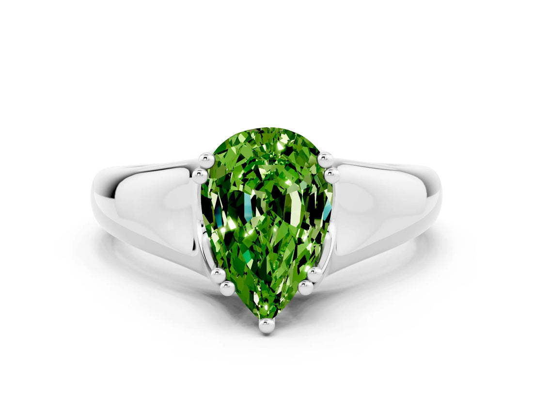 White gold Pear Cut Peridot Solitaire Ring with Wide Band and Prong Setting