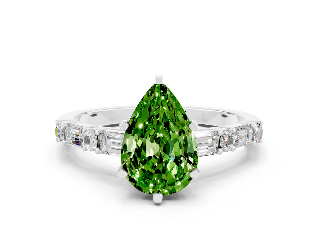 White gold Pear Cut Peridot Solitaire with Side Baguettes and Channel Set Band
