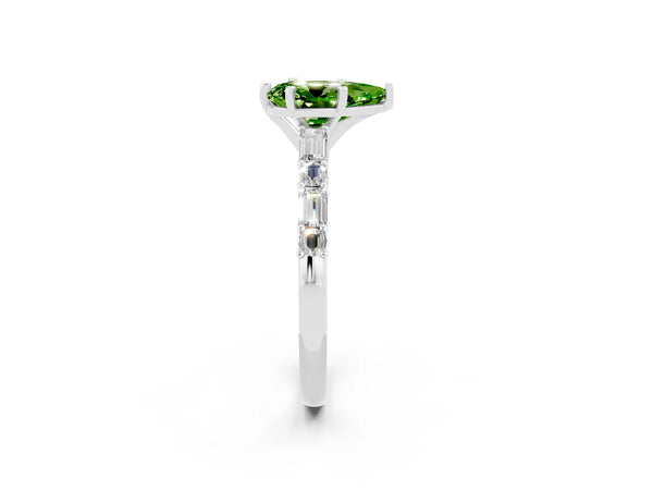 White gold Pear Cut Peridot Solitaire with Side Baguettes and Channel Set Band