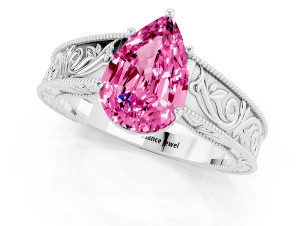 Silver Pear Cut Pink Sapphire Solitaire Ring with Engraved Band and Four-Prong Setting