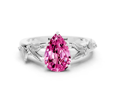 White gold Pear Cut Pink Sapphire Solitaire Ring with Leaf Motif Band and Four-Prong Setting
