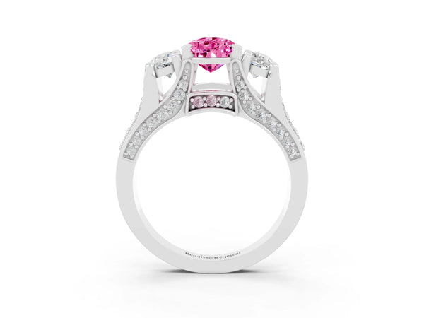Platinum Pear Cut Pink Sapphire Three-Stone Ring with Channel Set Band and Four-Prong Setting