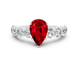 White gold Pear Cut Ruby Prong Setting with Side Stones on a Pave Band