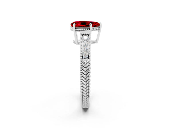 White gold Pear Cut Ruby Ring with Milgrain Pavé Band and Four-Prong Setting