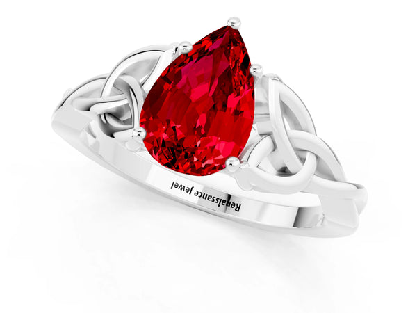 White gold Pear Cut Ruby Solitaire Celtic Knot Ring with Four-Prong Setting