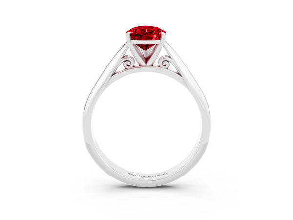 White gold Pear Cut Ruby Solitaire Engagement Ring with Cathedral Setting and Four-Prong Mount