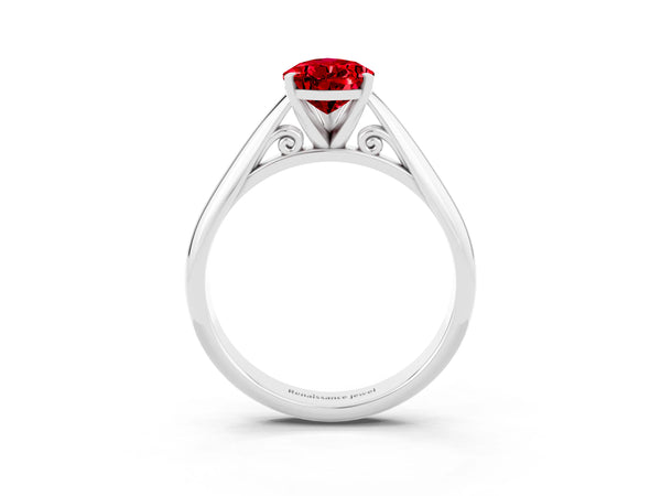 White gold Pear Cut Ruby Solitaire Engagement Ring with Cathedral Setting and Four-Prong Mount