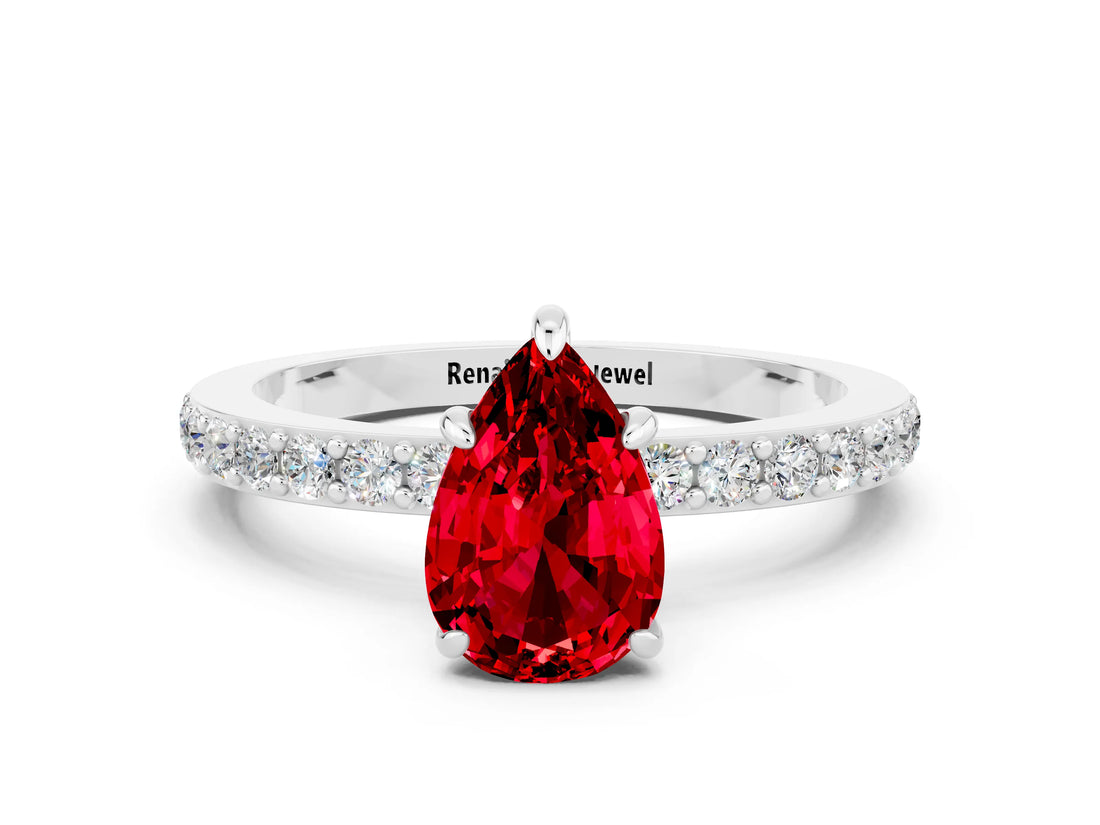 White gold Pear Cut Ruby Solitaire Engagement Ring with Pavé Band and Four-Prong Setting