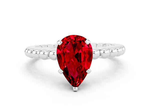 White gold Pear Cut Ruby Solitaire Ring with Beaded Band and Prong Setting