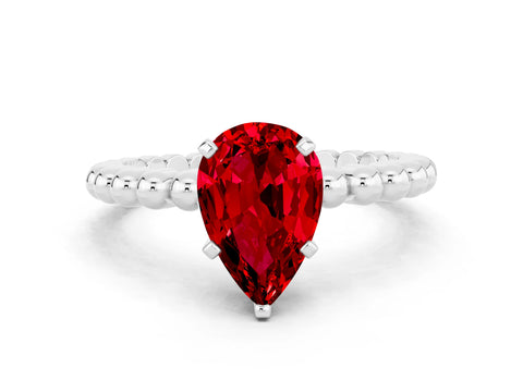 White gold Pear Cut Ruby Solitaire Ring with Beaded Band and Prong Setting