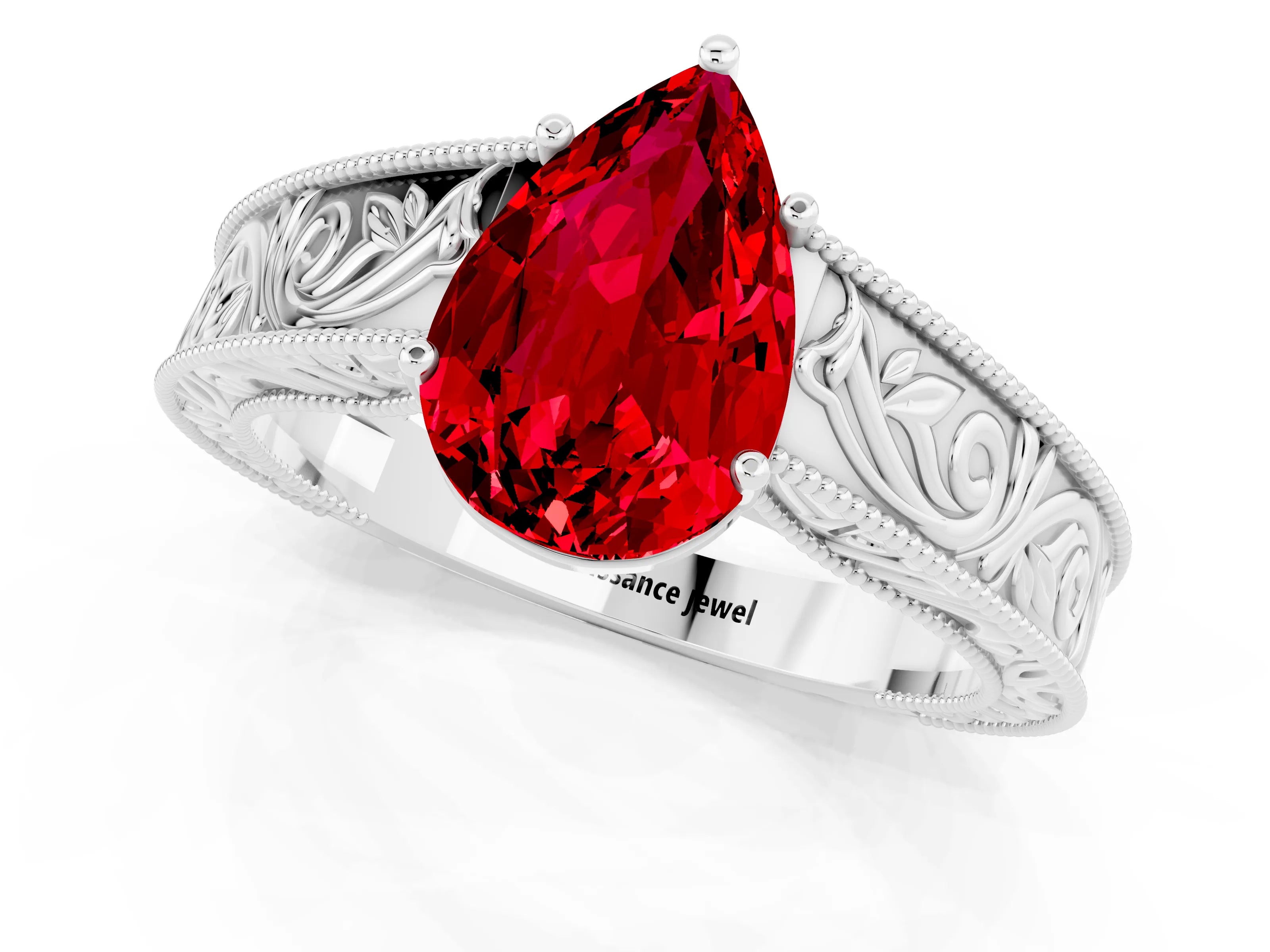 White gold Pear Cut Ruby Solitaire Ring with Engraved Band and Four-Prong Setting_1