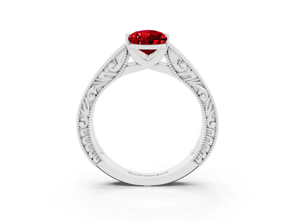 White gold Pear Cut Ruby Solitaire Ring with Engraved Band and Four-Prong Setting