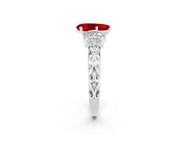 Silver Pear Cut Ruby Solitaire Ring with Filigree Band and Four-Prong Setting