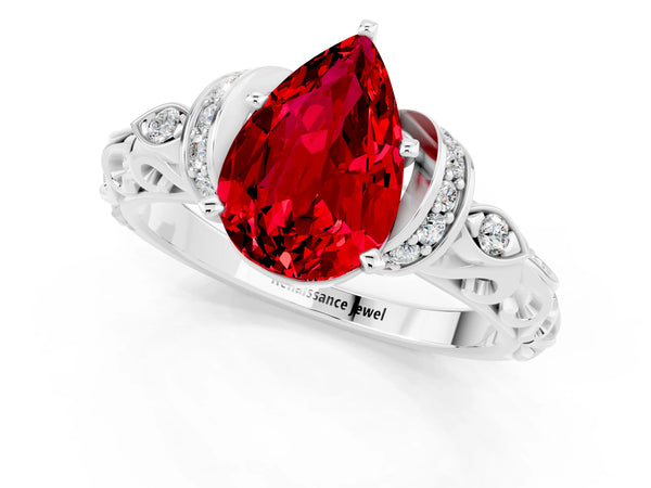 Platinum Pear Cut Ruby Solitaire Ring with Filigree Band and Four-Prong Setting