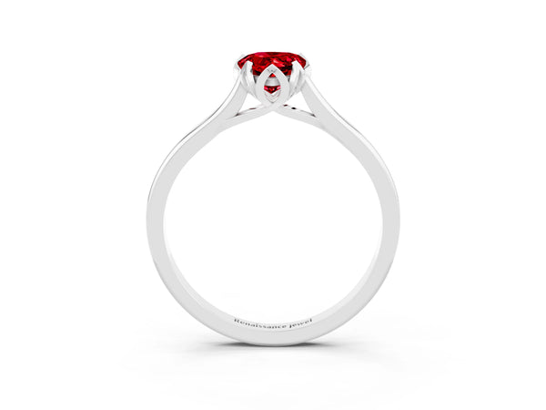 Platinum Pear Cut Ruby Solitaire Ring with Flower Prong Setting and Classic Band