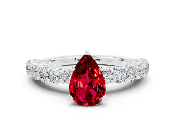 Platinum Pear Cut Ruby Solitaire Ring with Shared Prong Pavé Band and Four-Prong Setting