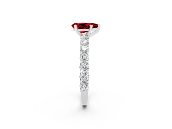 Silver Pear Cut Ruby Solitaire Ring with Shared Prong Pavé Band and Four-Prong Setting