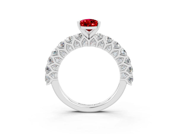 Platinum Pear Cut Ruby Solitaire Ring with Shared Prong Pavé Band and Four-Prong Setting