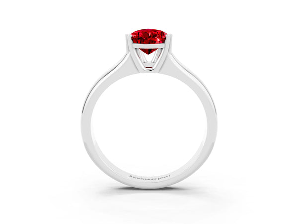 Platinum Pear Cut Ruby Solitaire Ring with Wide Band and Prong Setting