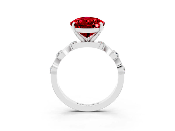 Platinum Pear Cut Ruby Solitaire Twisted Band with Round  Accents and Prong Setting