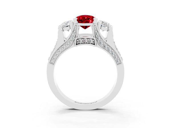 White gold Pear Cut Ruby Three-Stone Ring with Channel Set Band and Four-Prong Setting