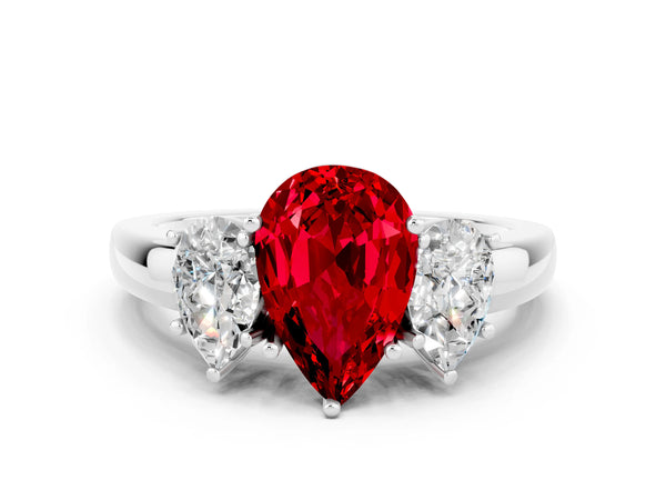 Platinum Pear Cut Ruby Three-Stone Ring with Four-Prong Setting and Classic Band