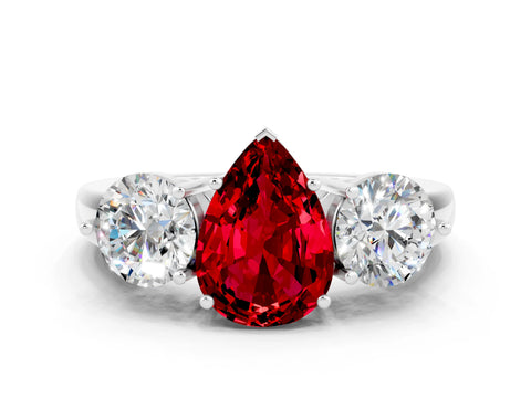 White gold Pear Cut Ruby Three-Stone Ring with Prong Setting and Classic Band
